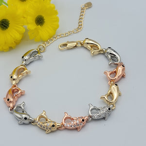 Bracelets - Tri Color Gold Plated. Dolphins - Clear crystals.