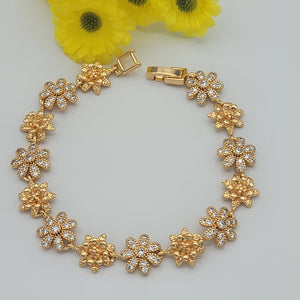 Bracelets - 18K Gold Plated. Flowers w clear crystals. *Premium Q*
