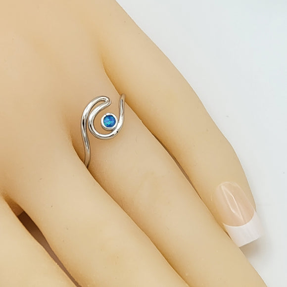 Rings - 925 Sterling Silver. Wave with Blue Opal Circle