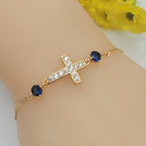 Bracelets - 18K Gold Plated. Blue Crystals Cross. *Premium Q*
